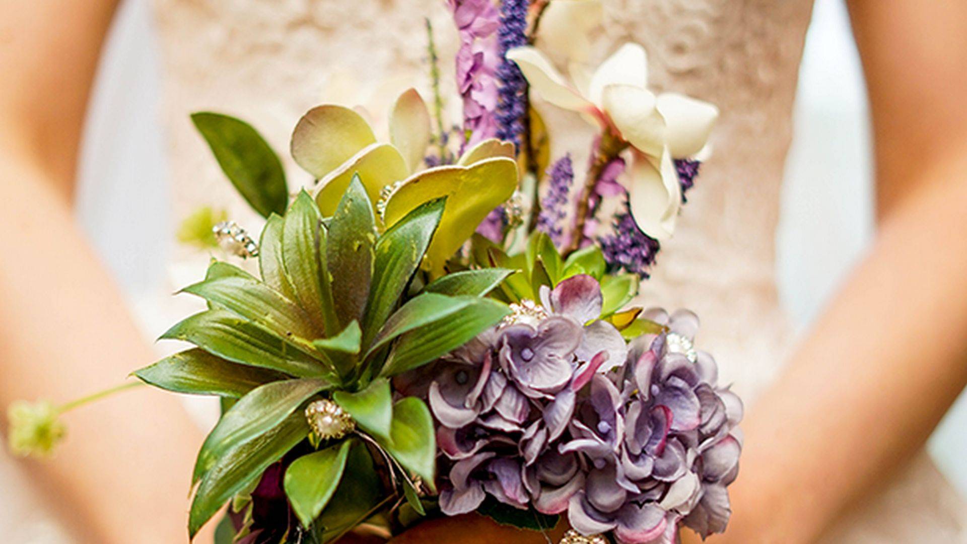 Bride holding flowers